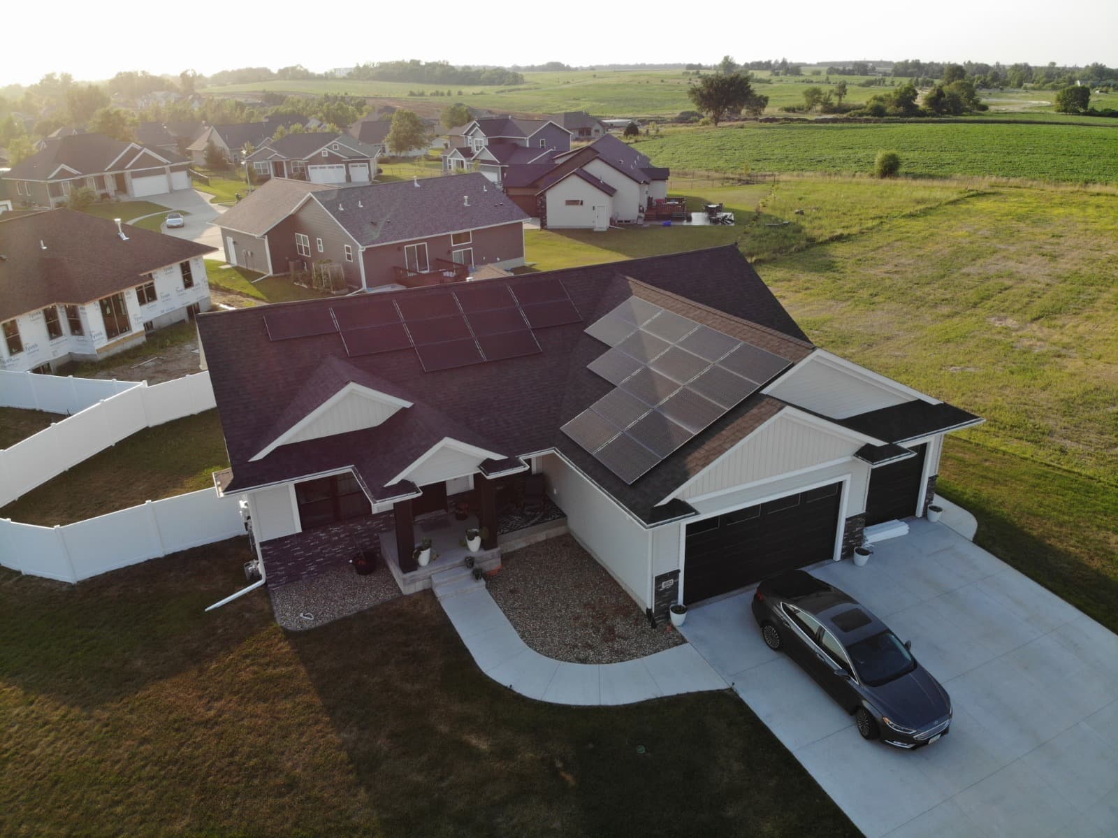 Aerial view of home with solar panels